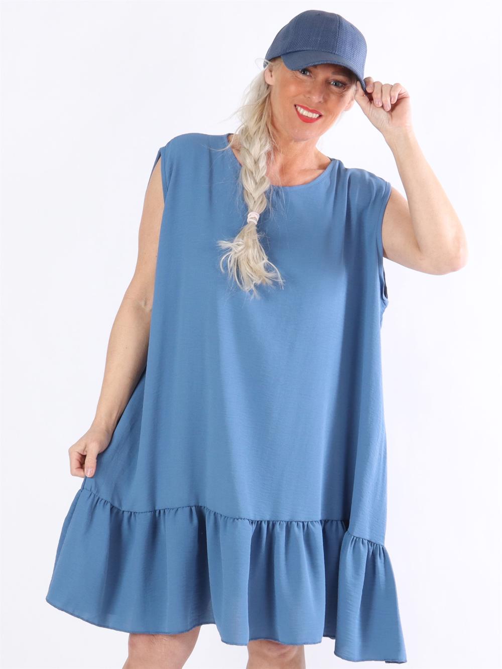 Manola - Kjole i løs pasform med flæsekant forneden